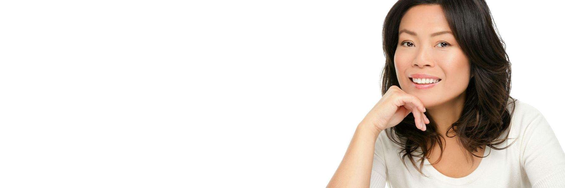 woman smiles widely with her dental implant in Black Rock VIC