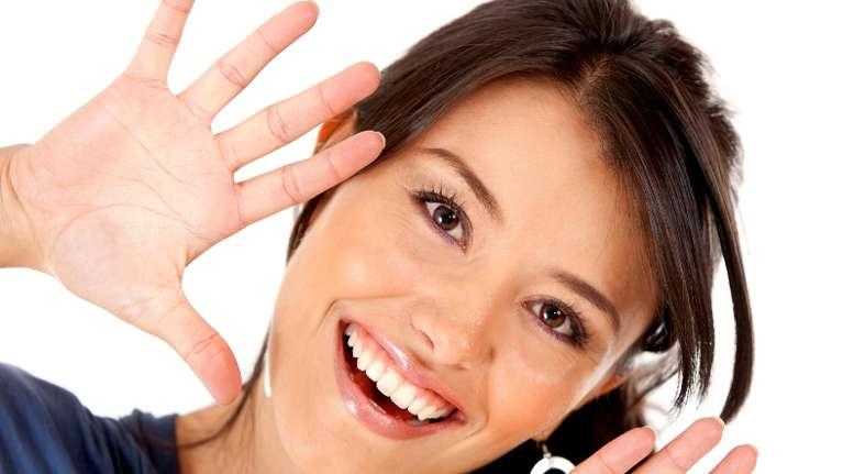 A woman with a healthy full set of teeth in Black Rock